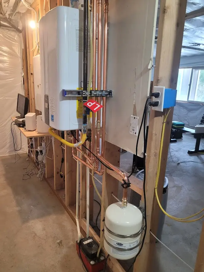 Licensed plumber repairing a kitchen sink in Northbrook