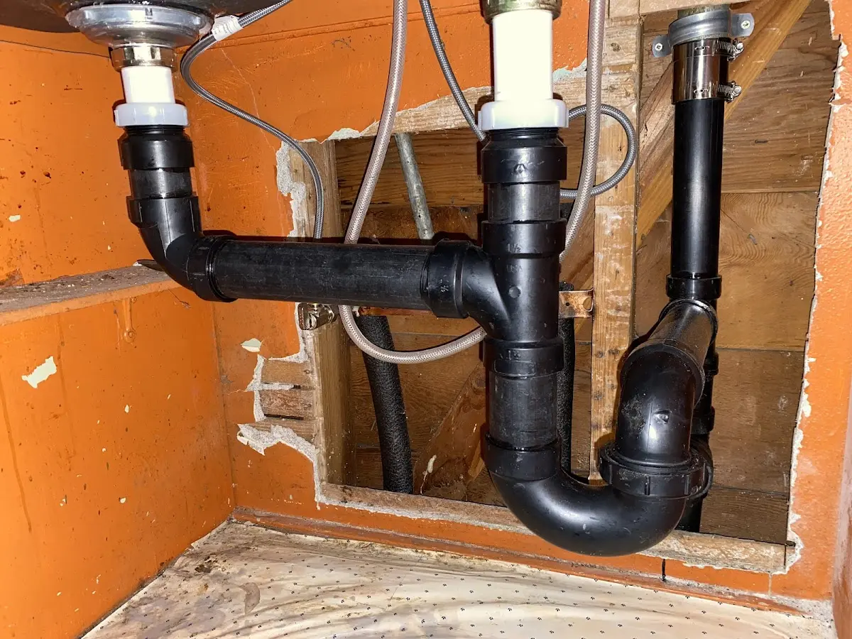 Professional Garbage Disposal Repair equipment and tools on the job in Northbrook